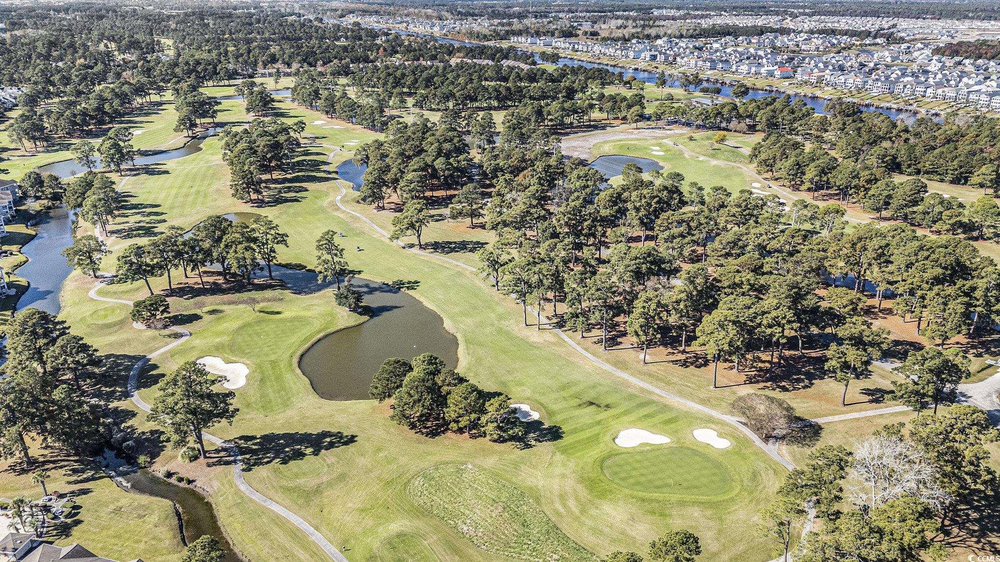 4754 Cloisters Lane Myrtle Beach, SC 29577 - Photo 32 of 32 Aerial view of property and surrounding area with a nearby body of water