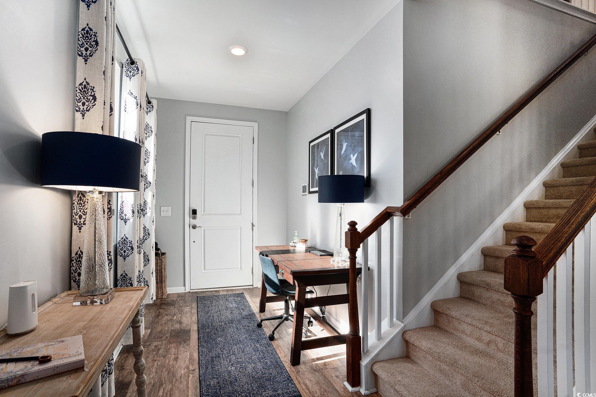4754 Cloisters Lane Myrtle Beach, SC 29577 - Photo 4 of 32 Entrance foyer featuring dark wood finished floors and baseboards
