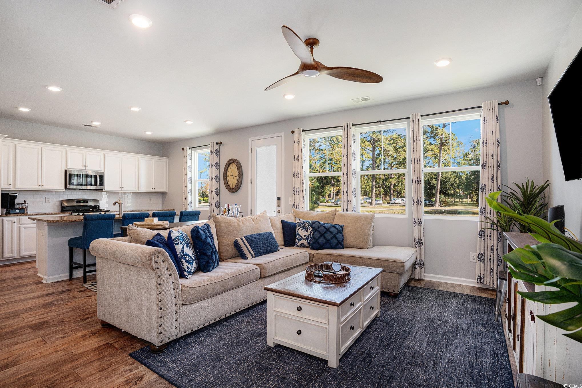 4754 Cloisters Lane Myrtle Beach, SC 29577 - Photo 5 of 32 Living area with plenty of natural light, dark wood-type flooring, ceiling fan, and recessed lighting
