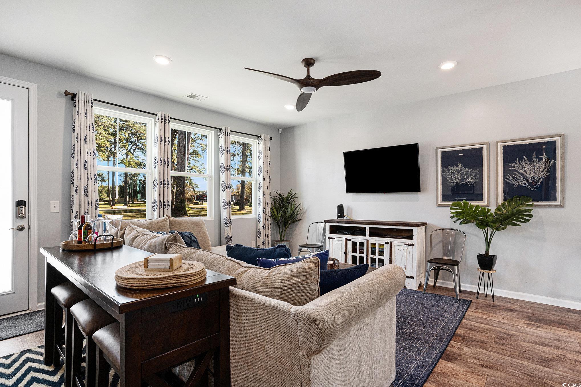 4754 Cloisters Lane Myrtle Beach, SC 29577 - Photo 6 of 32 Living area featuring a ceiling fan, recessed lighting, and dark wood-type flooring