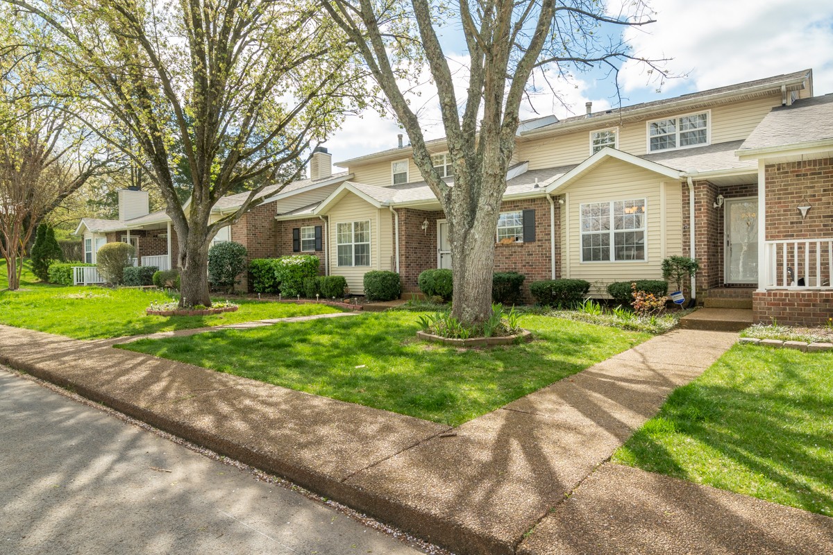 234 Pepper Ridge Circle Antioch, TN 37013 - Photo 2 of 28 a front view of a house with a yard