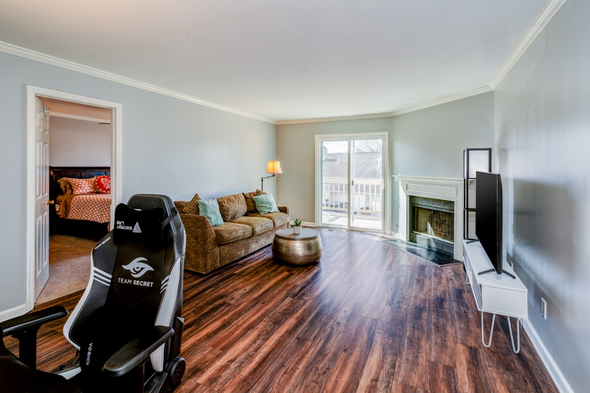 234 Pepper Ridge Circle Antioch, TN 37013 - Photo 12 of 28 a living room with furniture and a fireplace