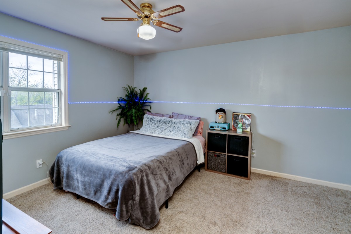 234 Pepper Ridge Circle Antioch, TN 37013 - Photo 18 of 28 a bedroom with a bed and window