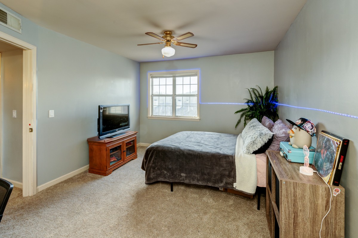 234 Pepper Ridge Circle Antioch, TN 37013 - Photo 19 of 28 a bedroom with furniture and a window