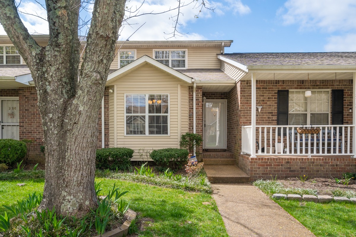 234 Pepper Ridge Circle Antioch, TN 37013 - Photo 3 of 28 a front view of a house with a yard