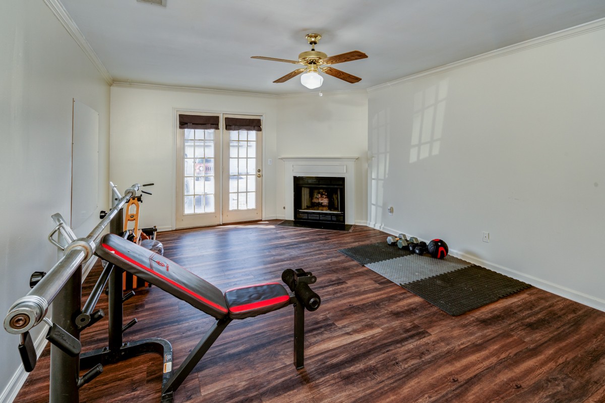234 Pepper Ridge Circle Antioch, TN 37013 - Photo 23 of 28 a living room with furniture a fireplace and a flat screen tv