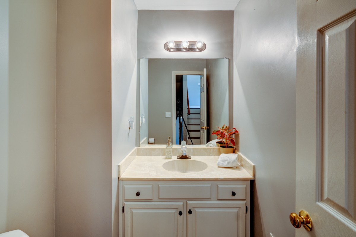 234 Pepper Ridge Circle Antioch, TN 37013 - Photo 24 of 28 a bathroom with a sink and a mirror