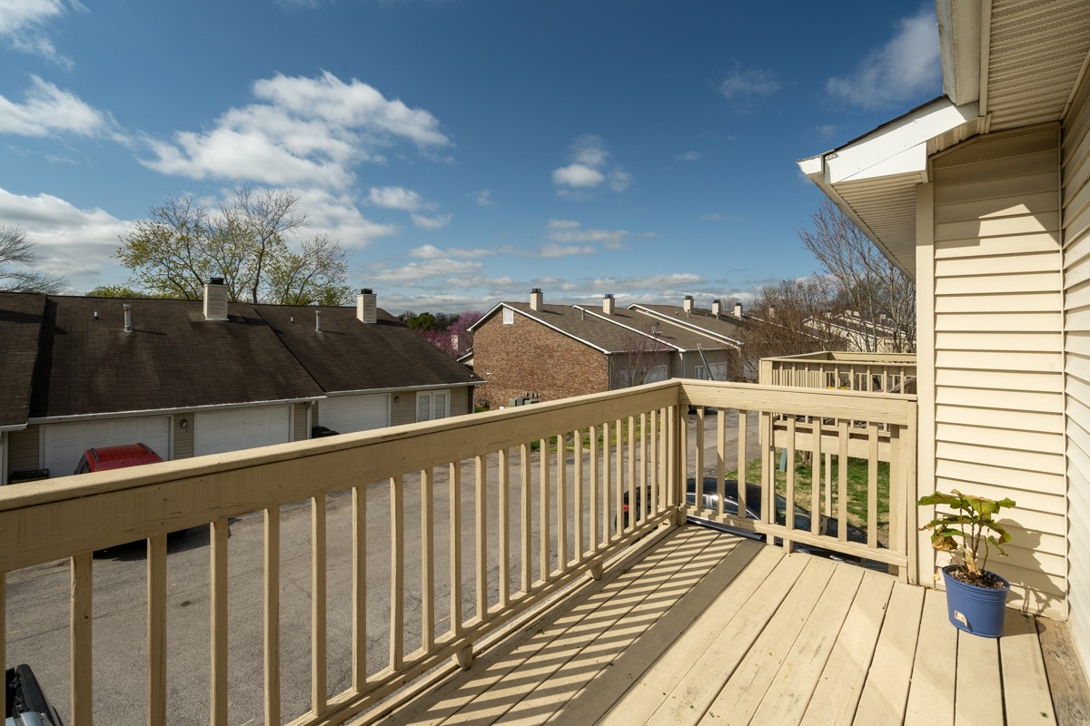 234 Pepper Ridge Circle Antioch, TN 37013 - Photo 27 of 28 a view of a balcony with wooden floor