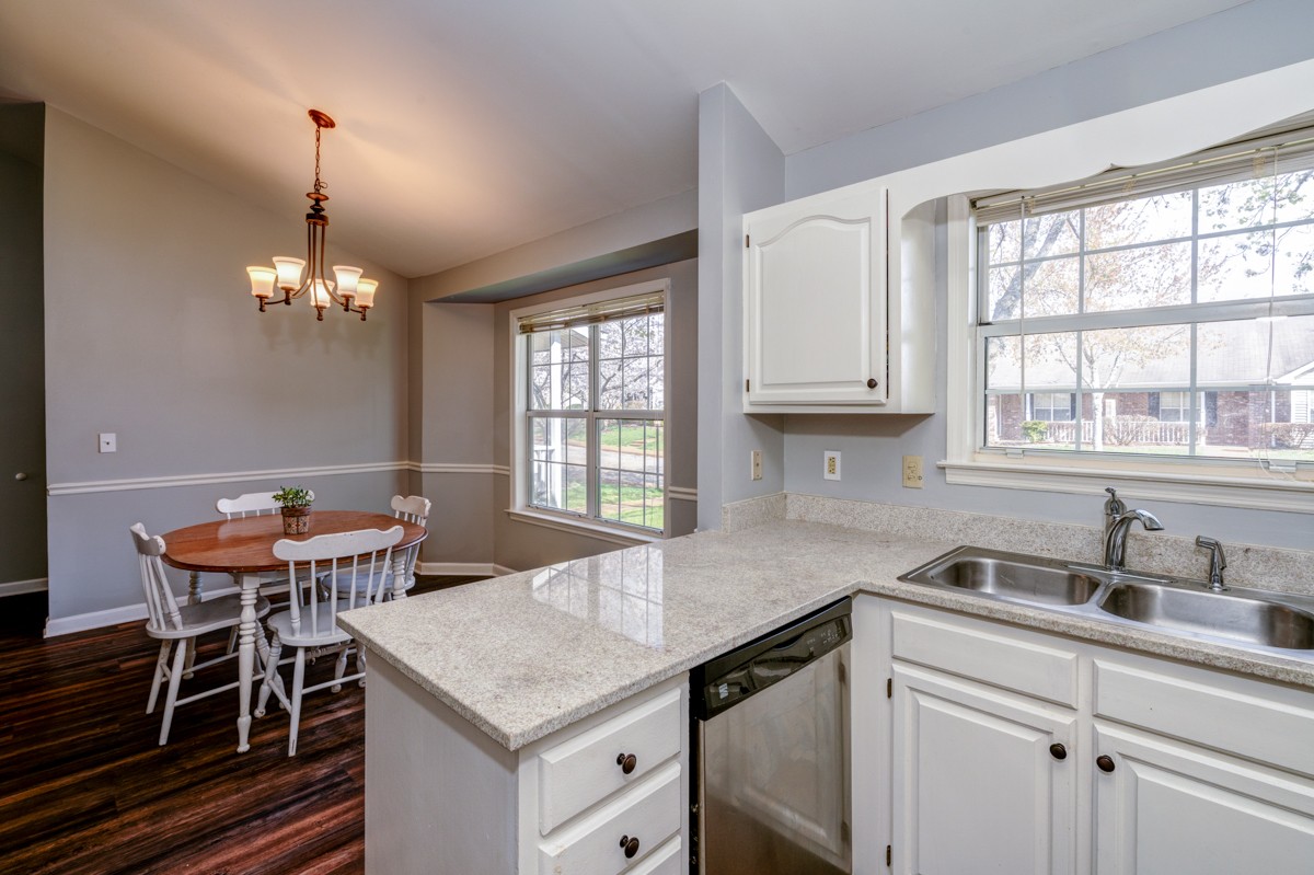 234 Pepper Ridge Circle Antioch, TN 37013 - Photo 6 of 28 a kitchen with a table chairs and a window