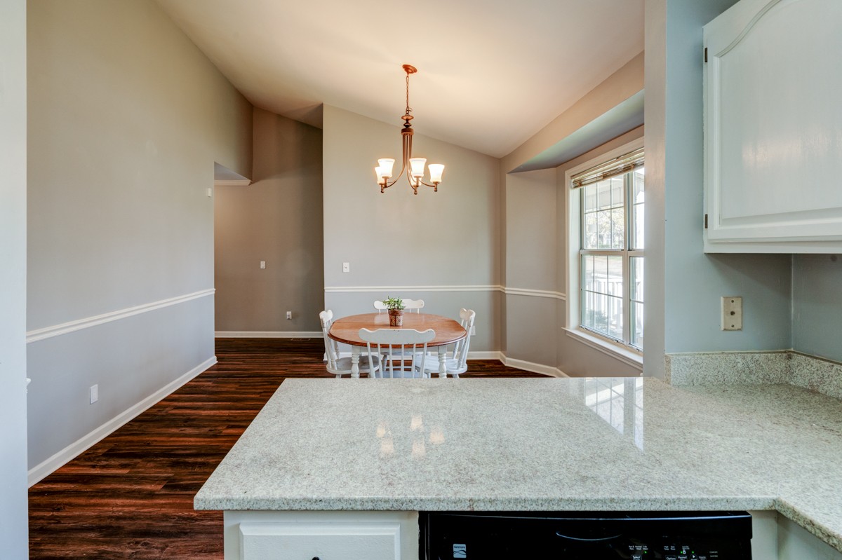234 Pepper Ridge Circle Antioch, TN 37013 - Photo 7 of 28 a living room with granite countertop furniture and fireplace