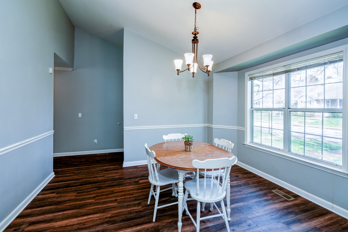 234 Pepper Ridge Circle Antioch, TN 37013 - Photo 9 of 28 a view of a dining room with furniture wooden floor and chandelier