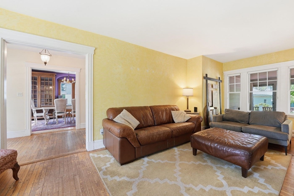 19 Humphrey Street Marblehead, MA 01945 - Photo 7 of 29 a living room with furniture and a large window