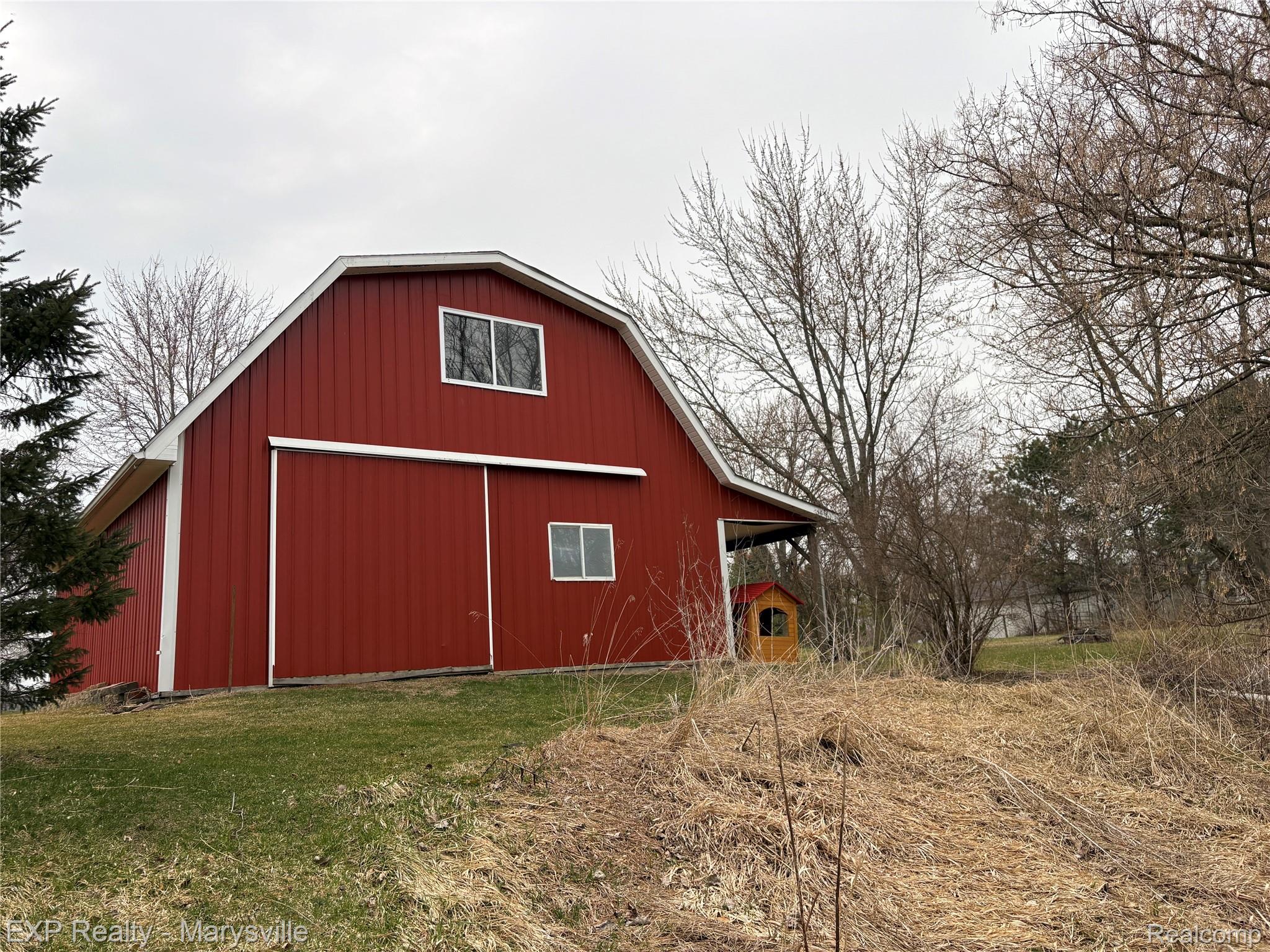 12265 Hough Road Memphis, MI 48041 - Photo 39 of 41 View of barn featuring a yard