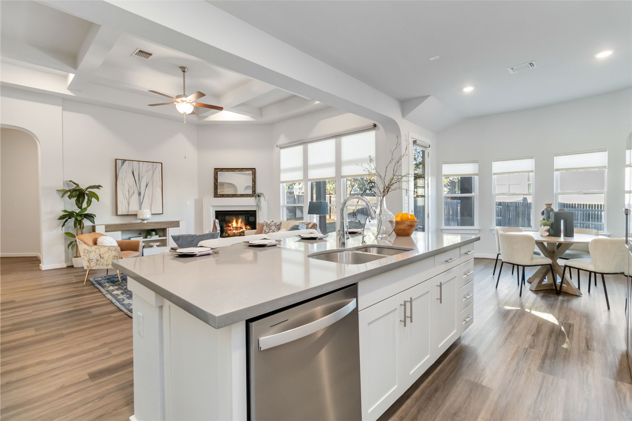 158 Sumter Way Kyle, TX 78640 - Photo 37 of 38 a open kitchen with stainless steel appliances granite countertop a lot of counter space and a wooden floors