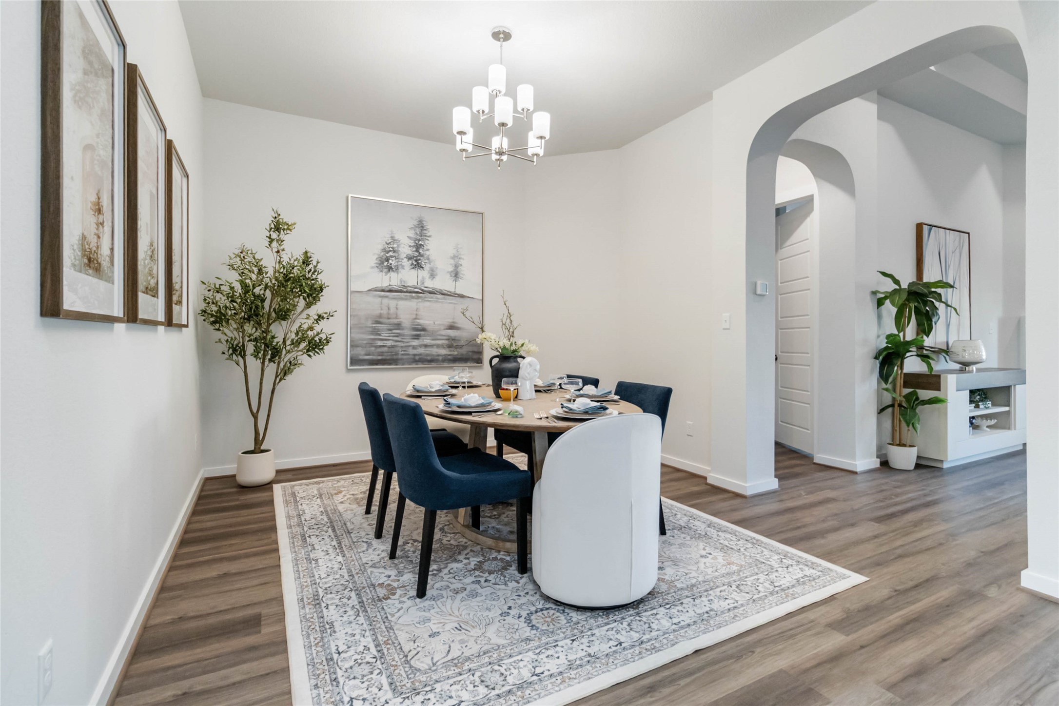158 Sumter Way Kyle, TX 78640 - Photo 19 of 38 a view of a dining room with furniture and wooden floor