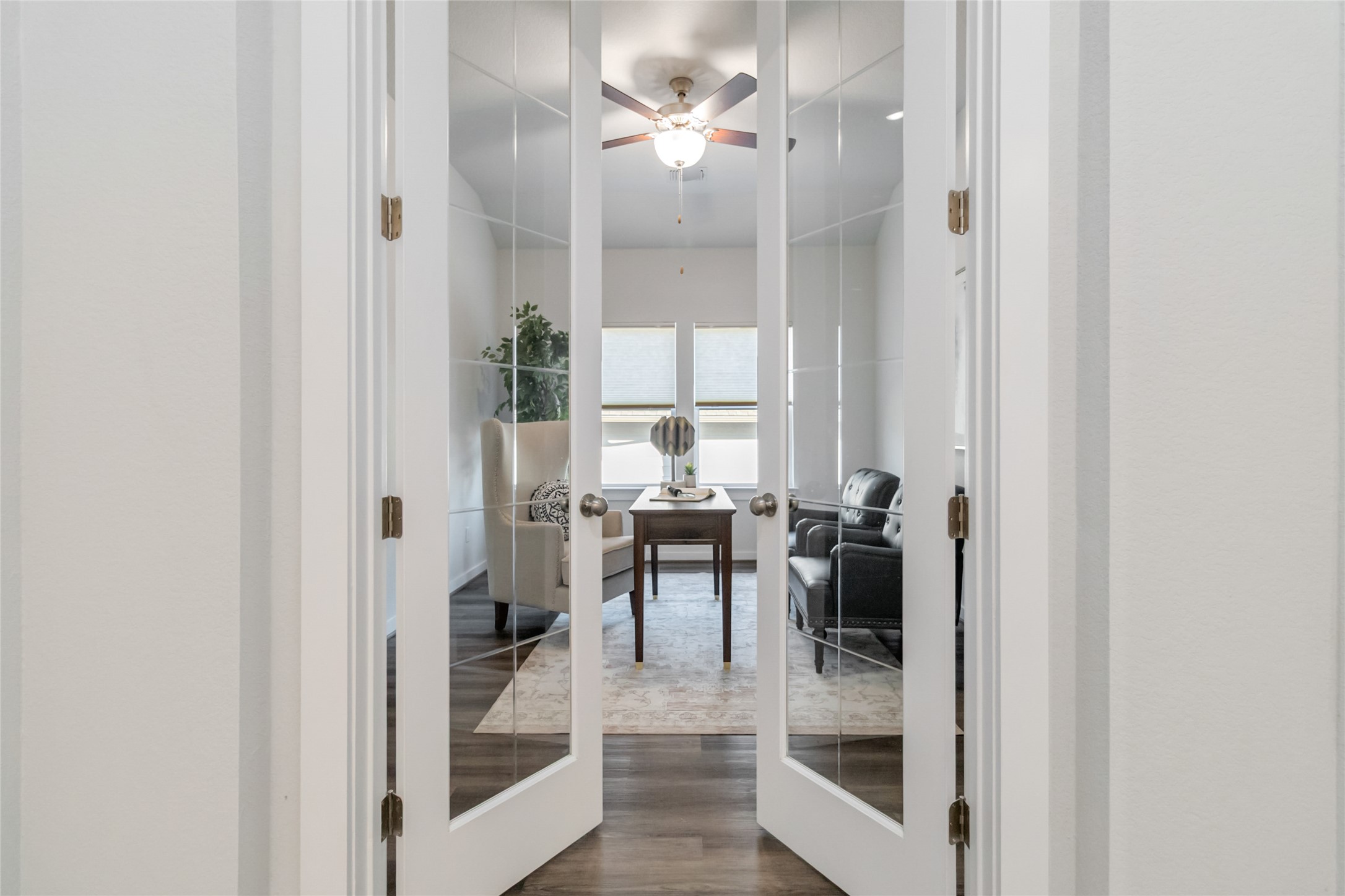 158 Sumter Way Kyle, TX 78640 - Photo 20 of 38 a view of a dining room with furniture window and wooden floor