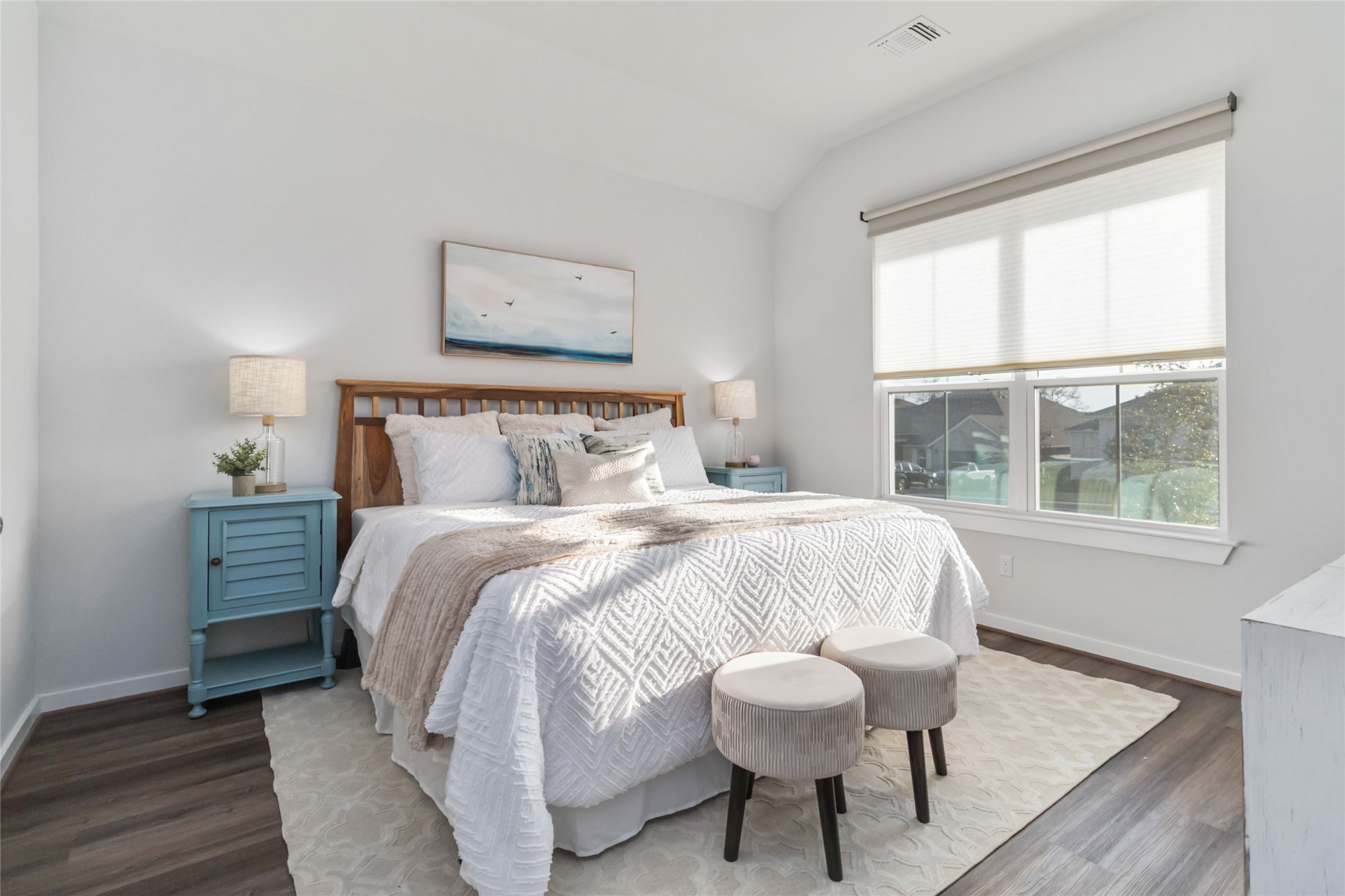 158 Sumter Way Kyle, TX 78640 - Photo 26 of 38 a bedroom with a bed and a table