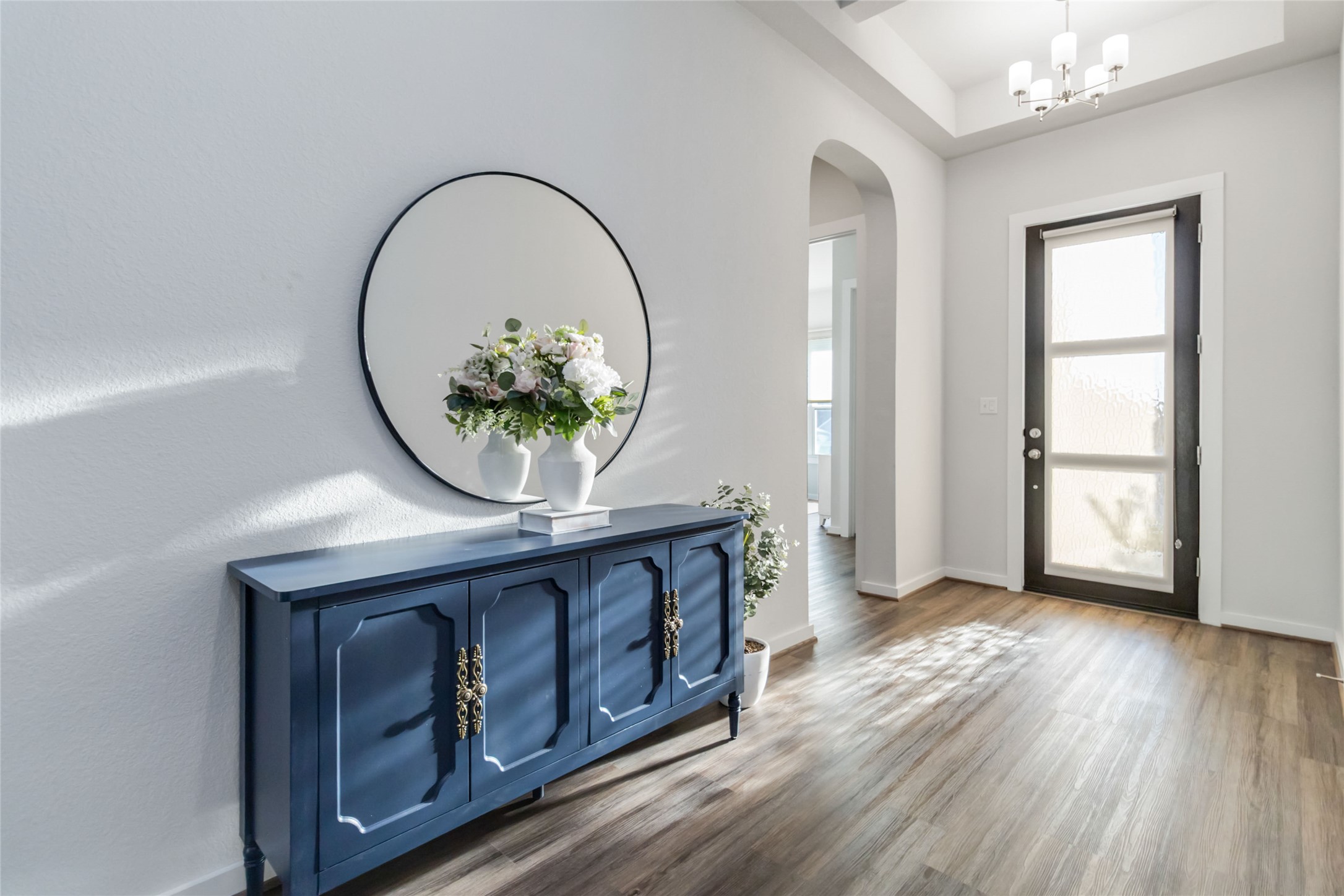 158 Sumter Way Kyle, TX 78640 - Photo 5 of 38 a view of an entryway with wooden floor