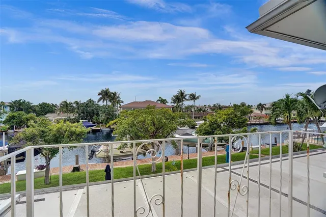 a view of a garden with sitting area