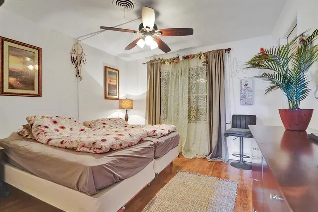 a view of hall way with furniture and stairs