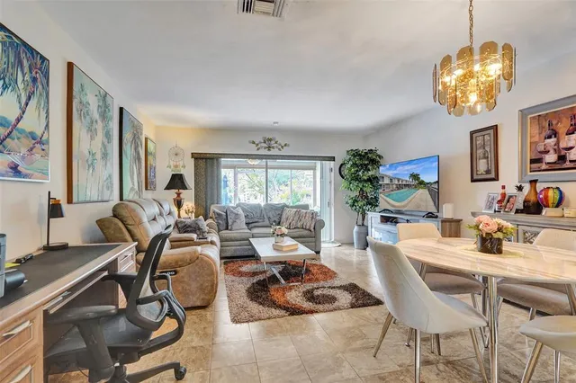 a view of a dining room with furniture window and outside view