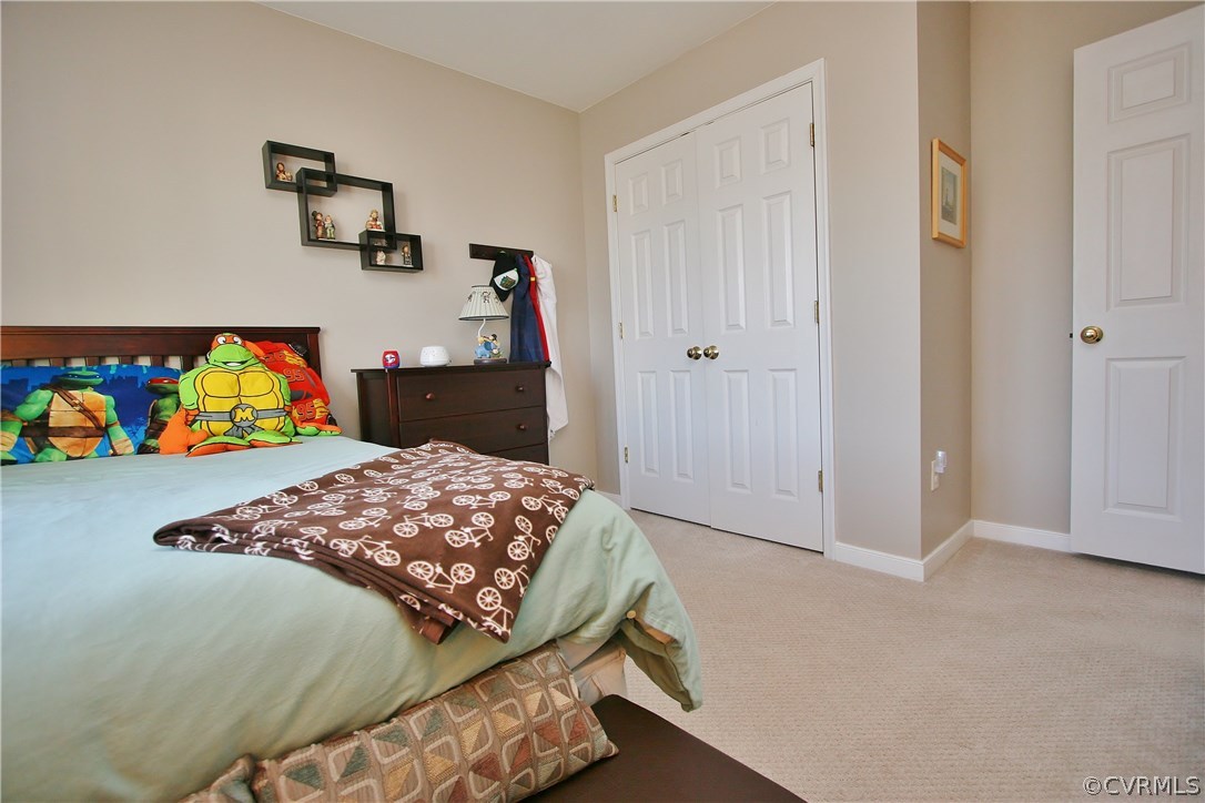 5318 Hackney Road North Chesterfield, VA 23234 - Photo 28 of 41 a bedroom with a bed and painting on the wall
