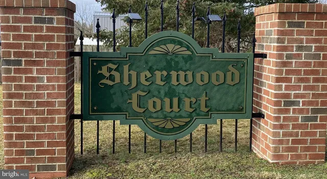 a sign on the wall of building