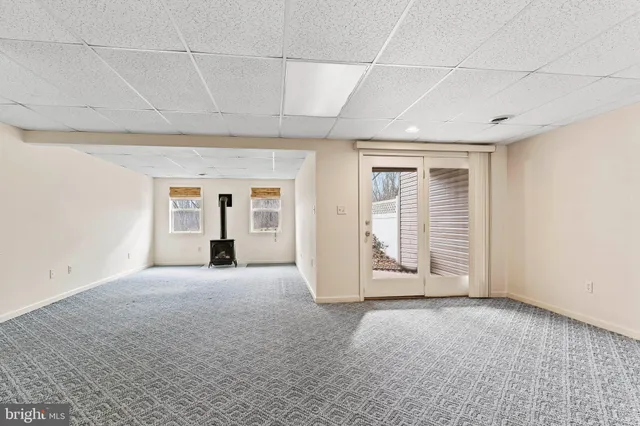 a view of an empty room with closet