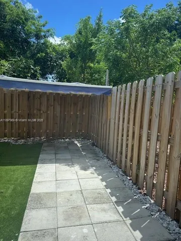 a view of a wooden fence
