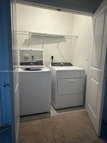 a bathroom with a glass door shower