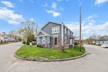 15 Ancona Road, Unit 1 Worcester, MA 01604 - Photo 11 of 11 a front view of a house with a yard