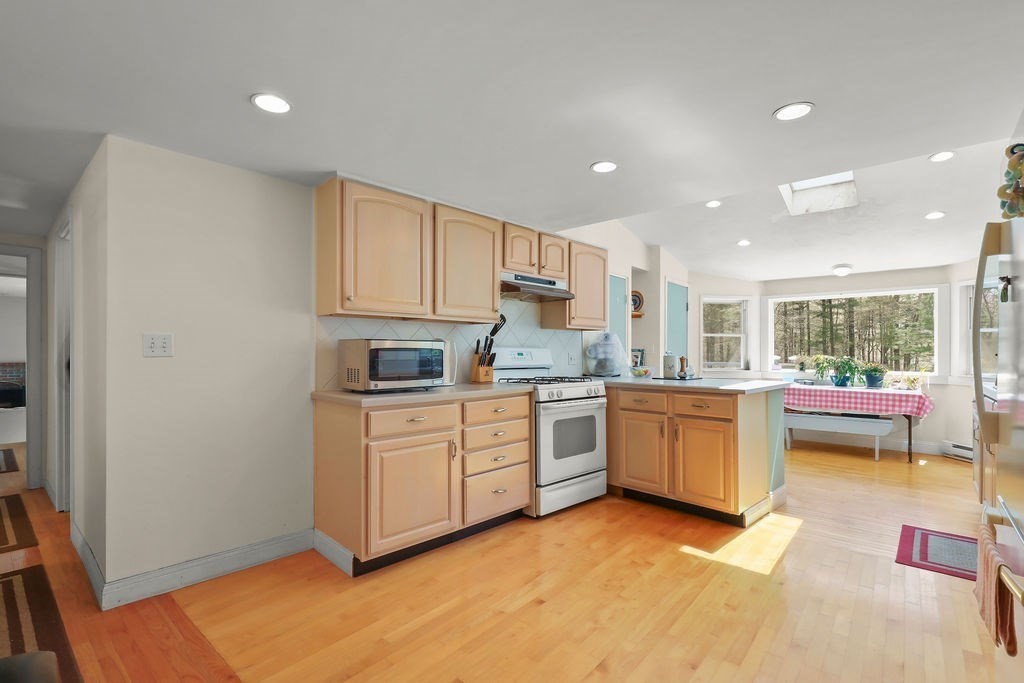 94 Fearing Hill Road Wareham, MA 02576 - Photo 16 of 41 a kitchen with a refrigerator and a sink