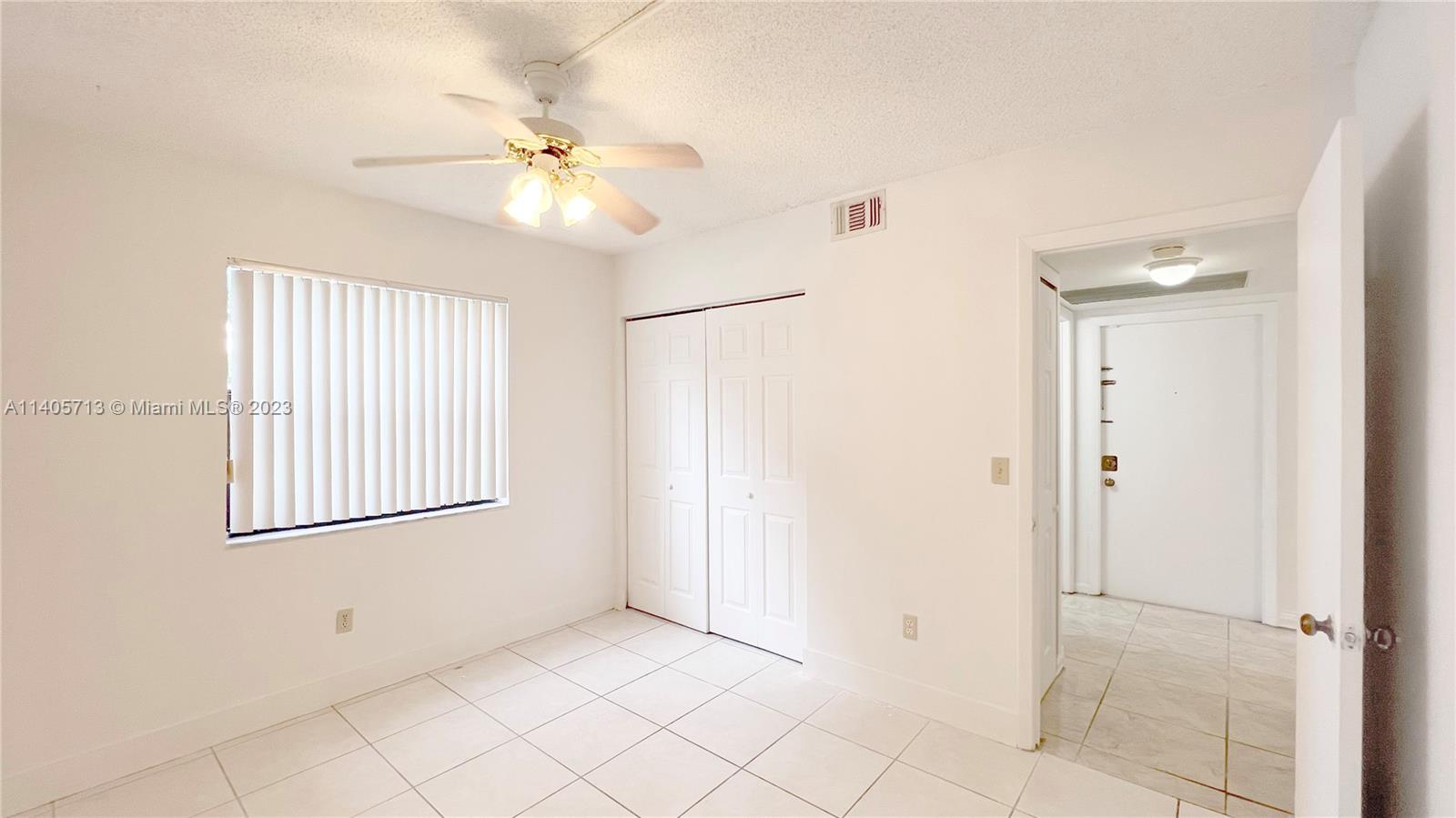 The Hammocks Miami, FL 33196 - Photo 12 of 20 a view of an empty room with a window