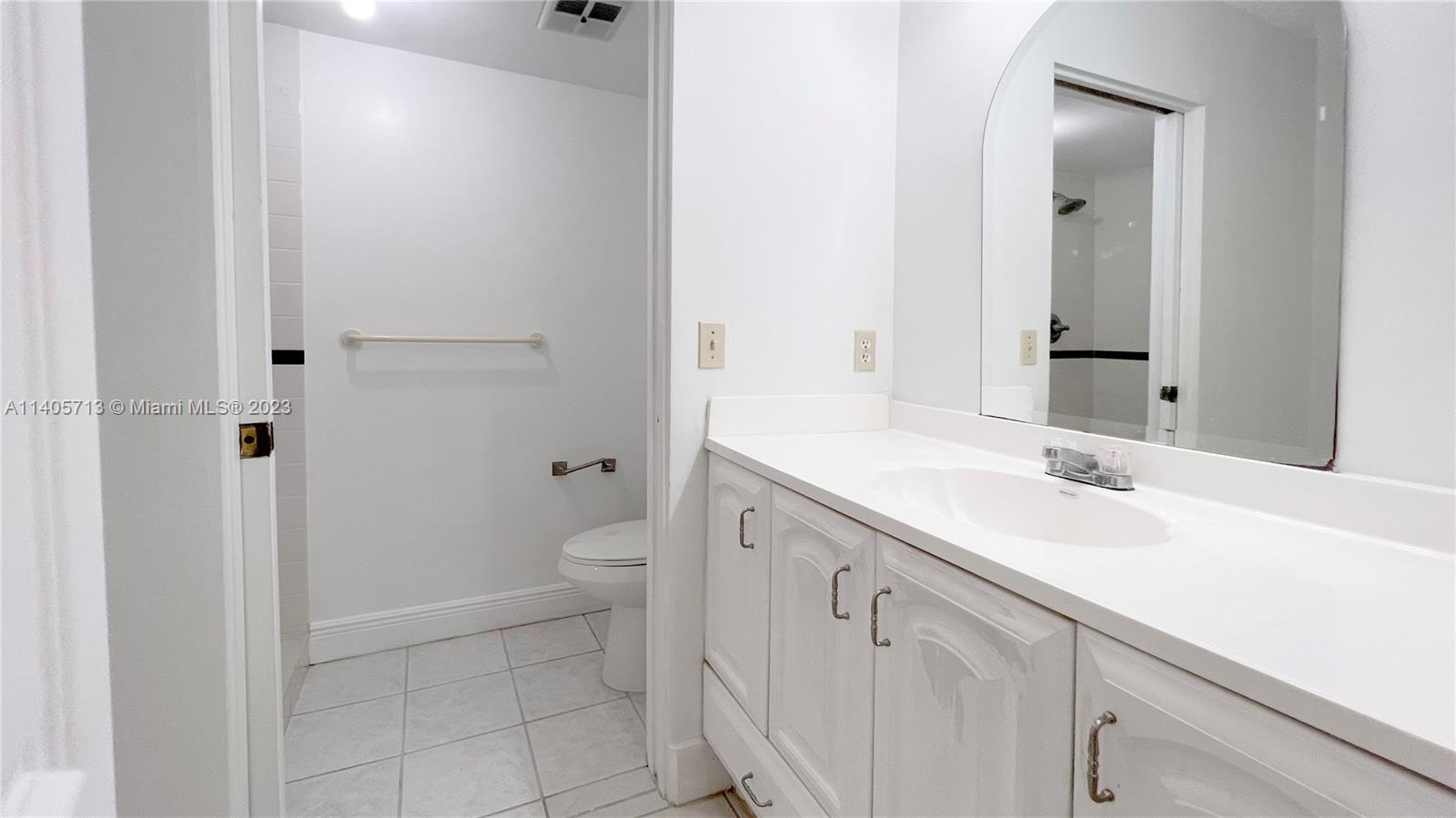 The Hammocks Miami, FL 33196 - Photo 20 of 20 a bathroom with a sink a toilet and shower