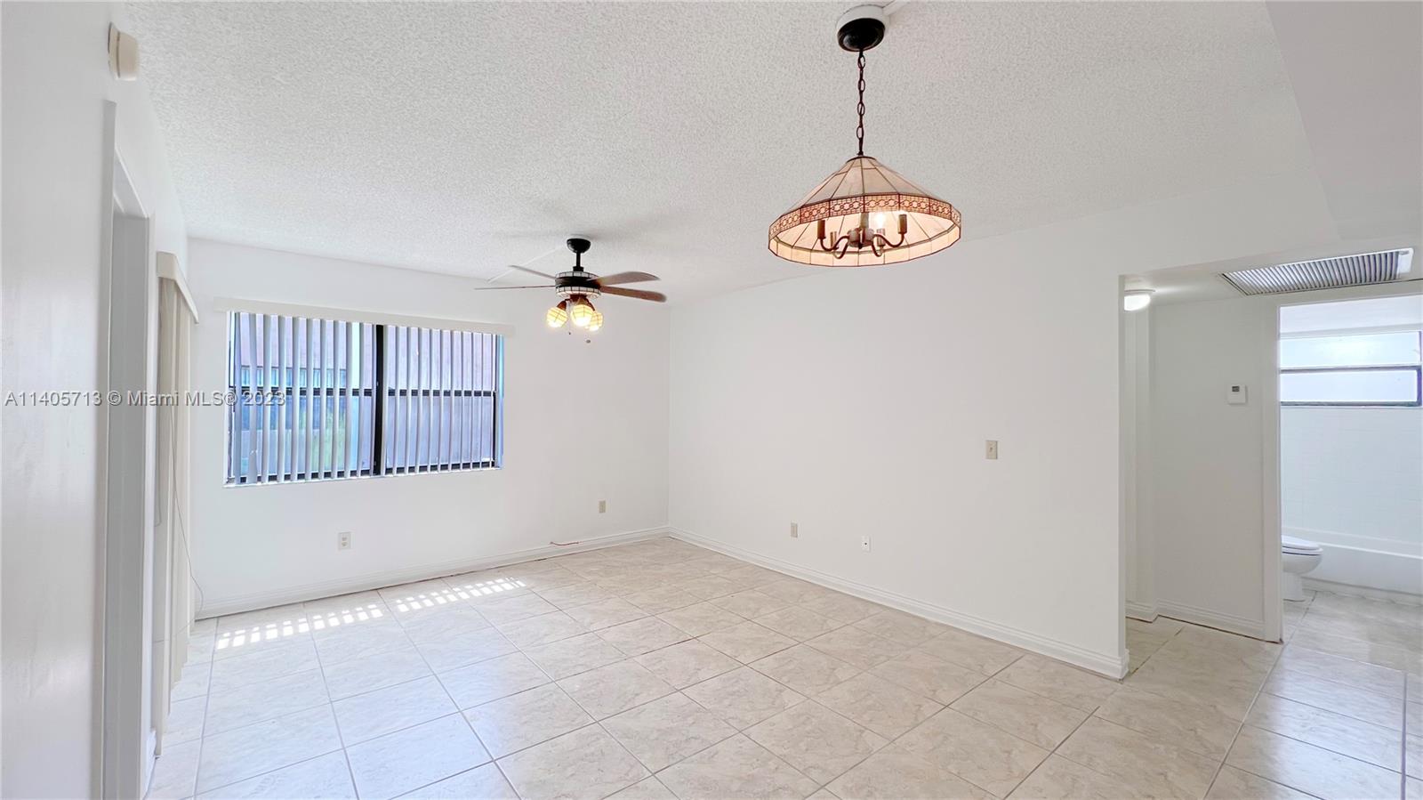 The Hammocks Miami, FL 33196 - Photo 7 of 20 a view of an empty room with a window