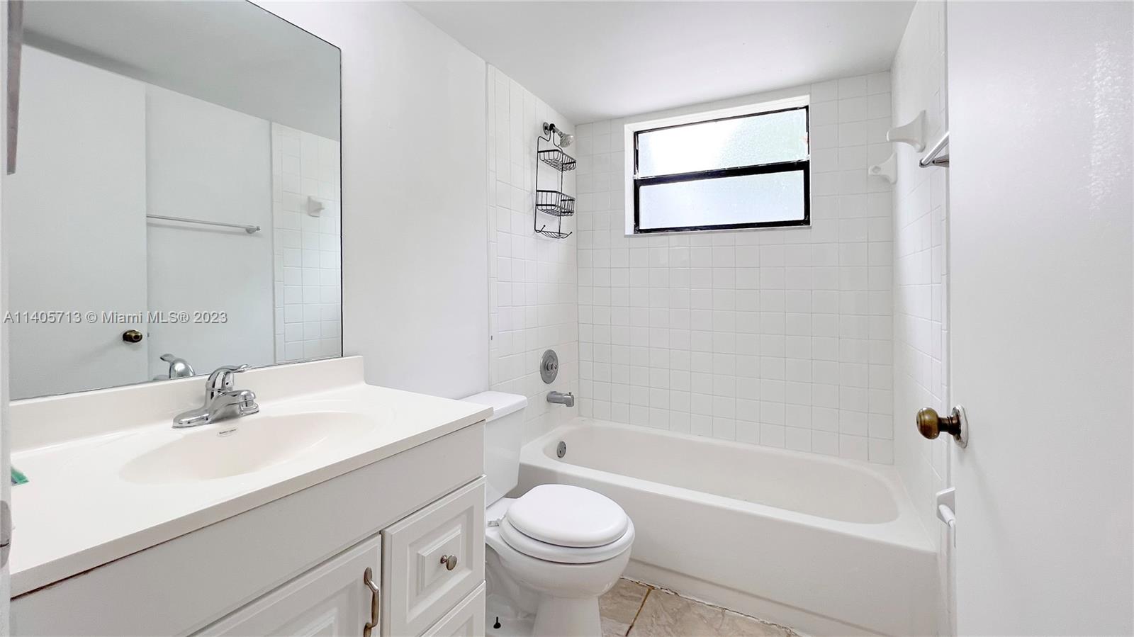 The Hammocks Miami, FL 33196 - Photo 8 of 20 a bathroom with a sink a toilet and a bathtub