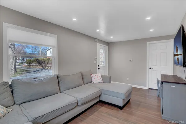 a living room with furniture and a couch