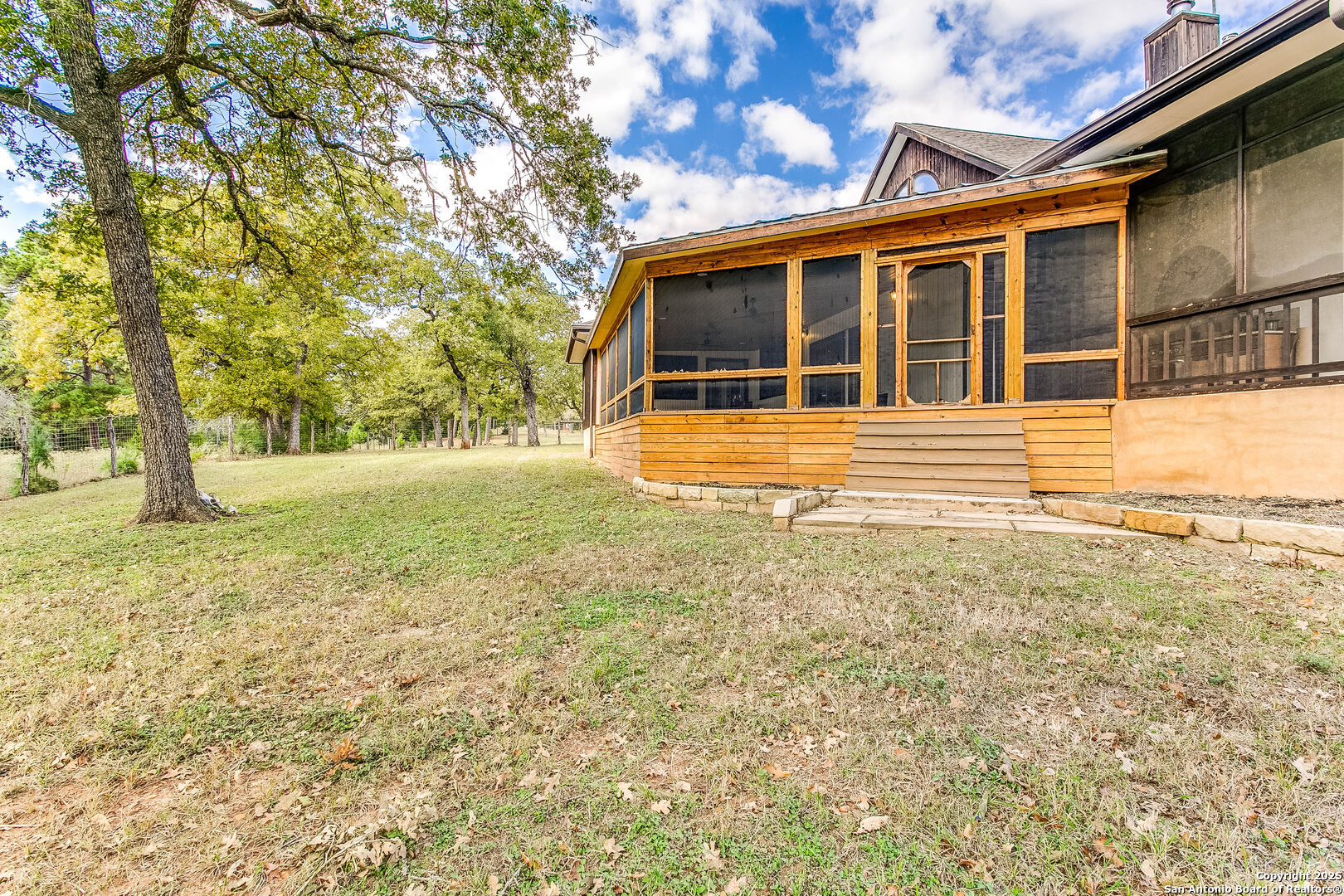 408 Copeland Hill Road Smithville, TX 78957 - Photo 24 of 35 a view of a house with a yard