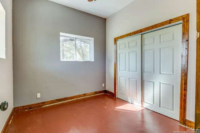 an empty room with closet