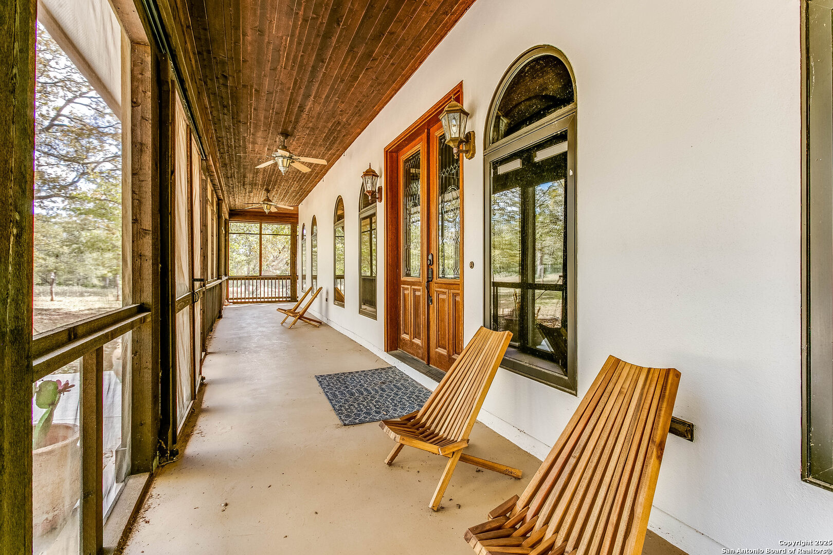 408 Copeland Hill Road Smithville, TX 78957 - Photo 4 of 35 a view of an chairs and table in balcony