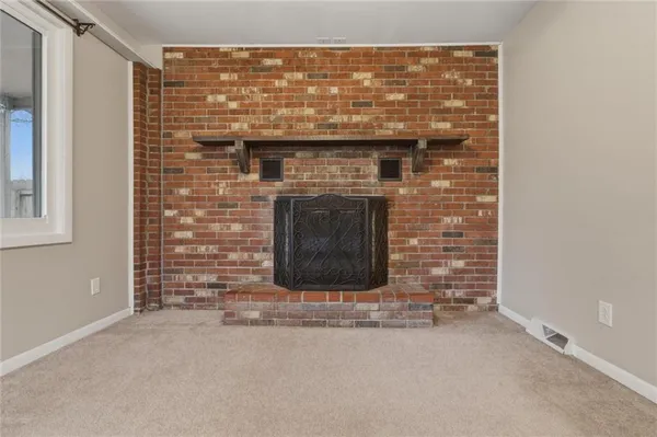 a room with a fireplace