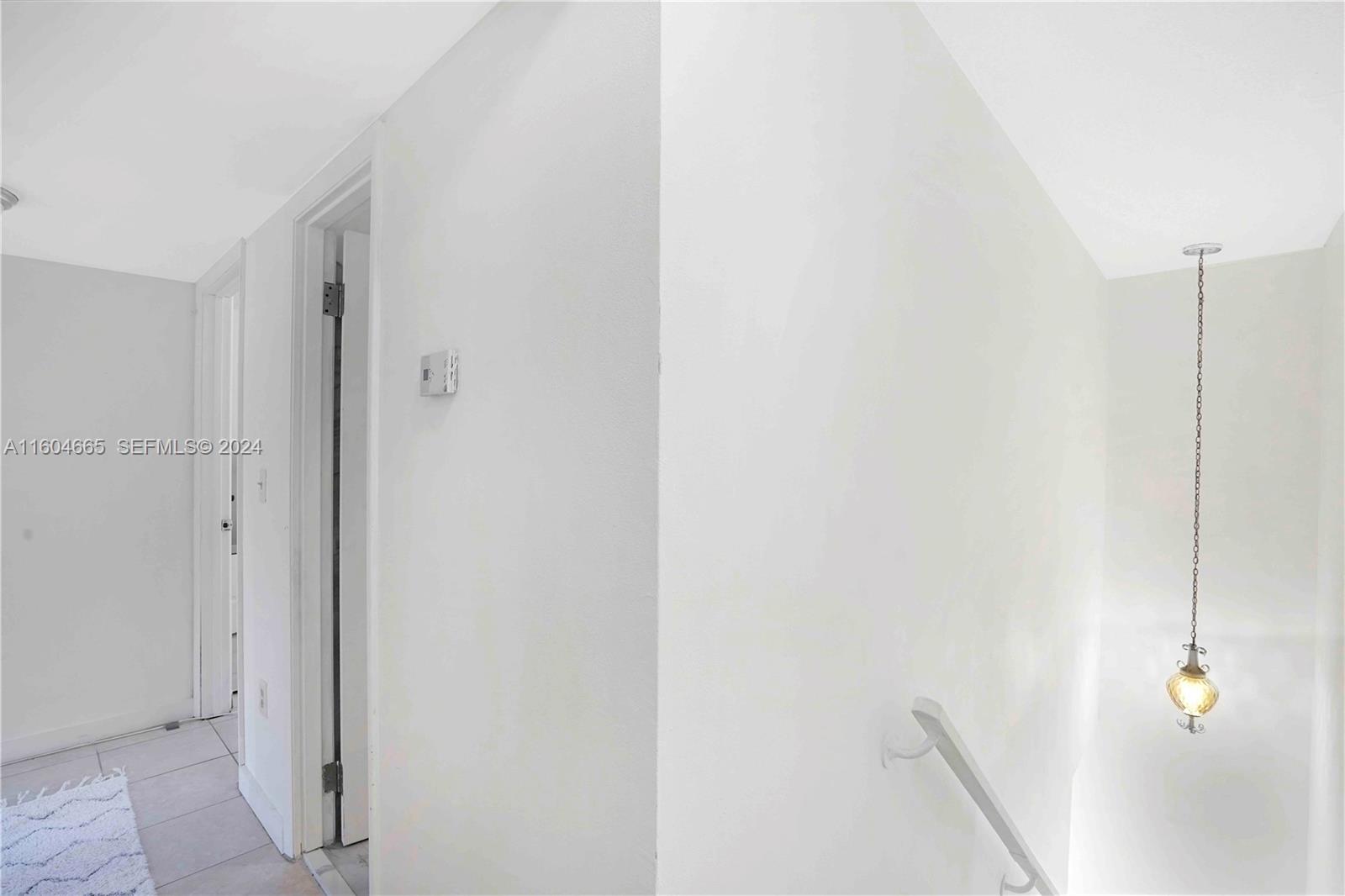 624 Northwest 11th Street Miami, FL 33136 - Photo 16 of 26 a view of a hallway with closet