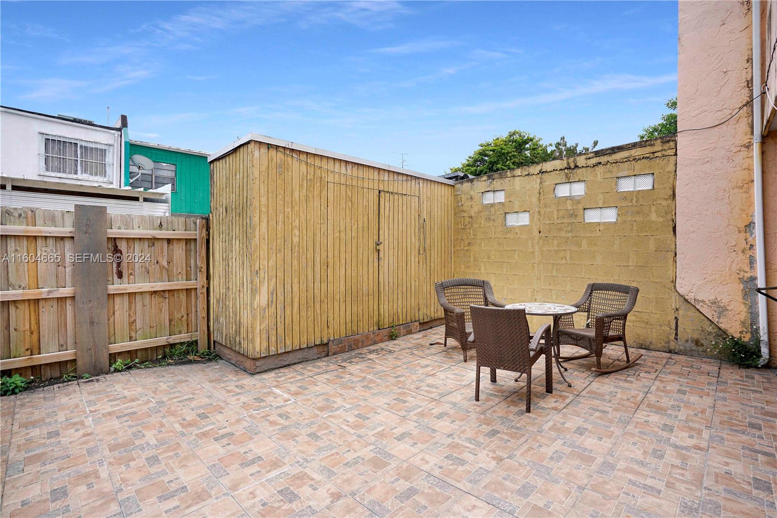624 Northwest 11th Street Miami, FL 33136 - Photo 26 of 26 a view of a chairs and table in patio