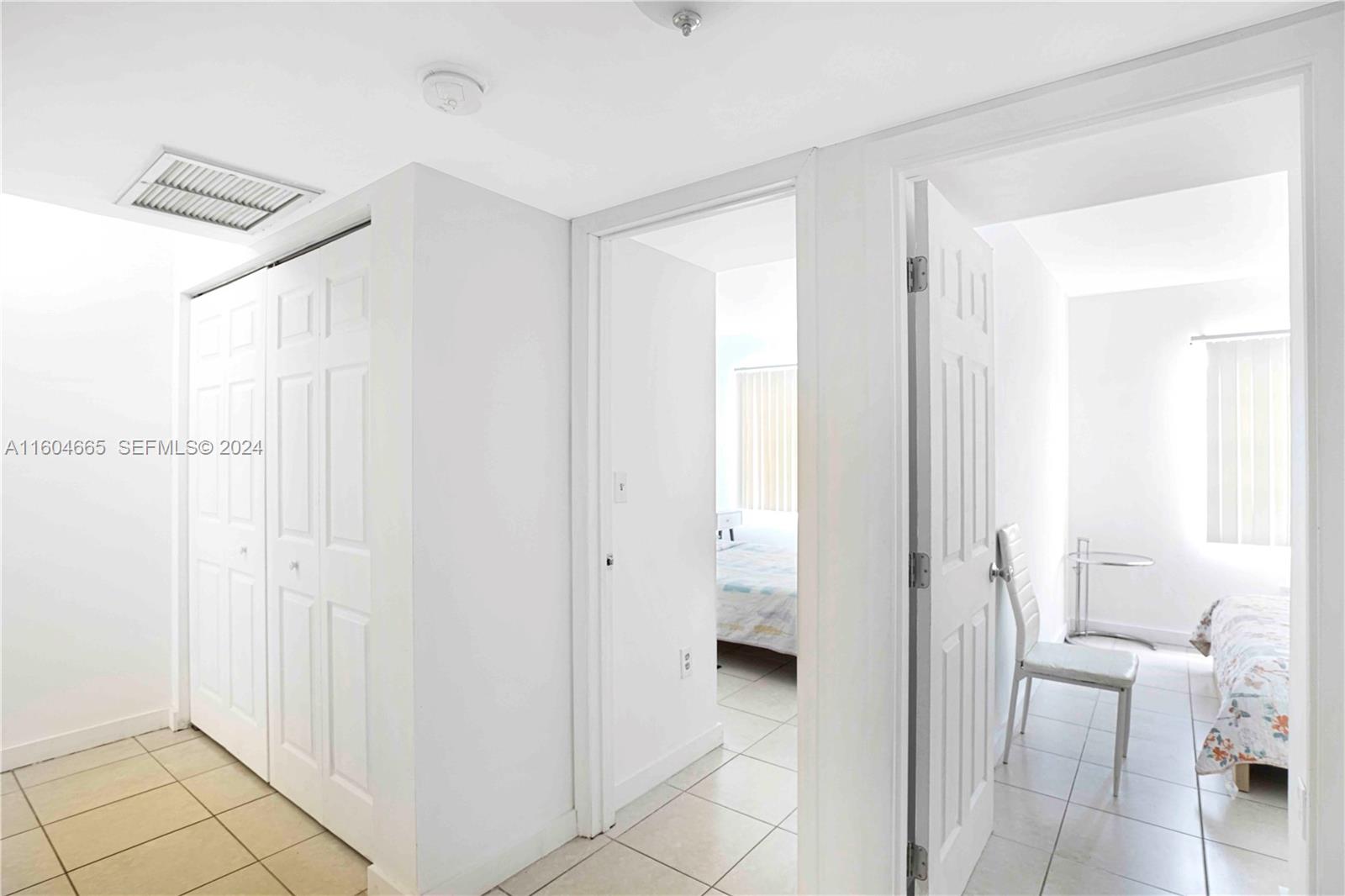 624 Northwest 11th Street Miami, FL 33136 - Photo 7 of 26 a bathroom with a glass door shower