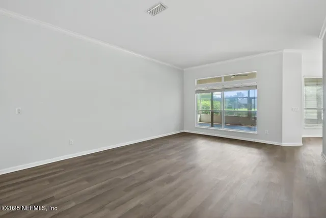 a kitchen with sink stove and cabinets