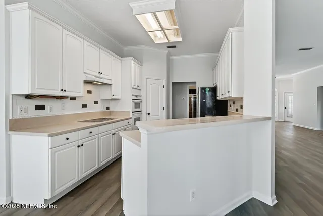 front view of a house with a garden