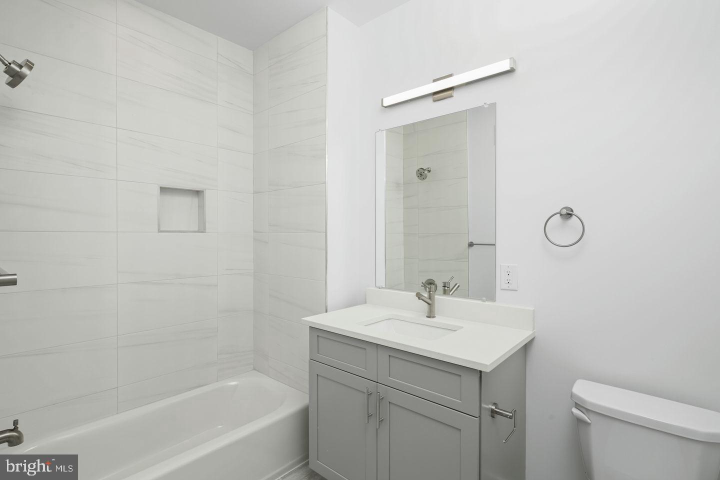 2721 Federal Street, Unit 3 Philadelphia, PA 19146 - Photo 13 of 22 a bathroom with a sink a toilet and shower
