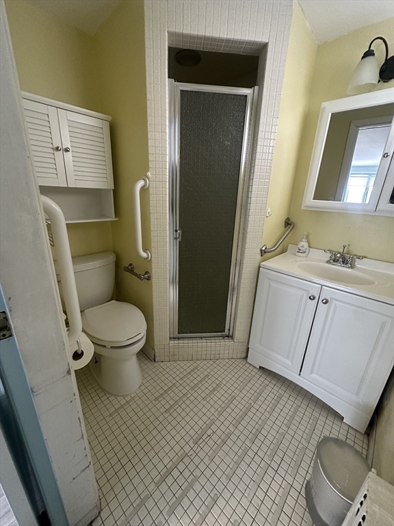 101 Hackensack Road Boston, MA 02467 - Photo 16 of 33 a bathroom with a sink toilet and shower