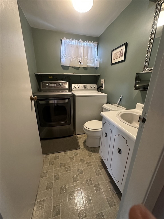 101 Hackensack Road Boston, MA 02467 - Photo 18 of 33 a bathroom with a stove a sink and a shower