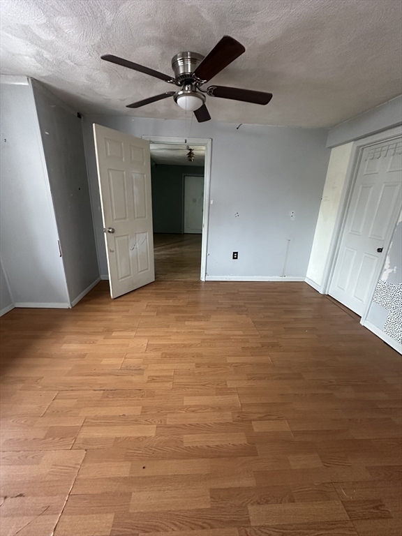 101 Hackensack Road Boston, MA 02467 - Photo 25 of 33 a view of a livingroom with a ceiling fan and window